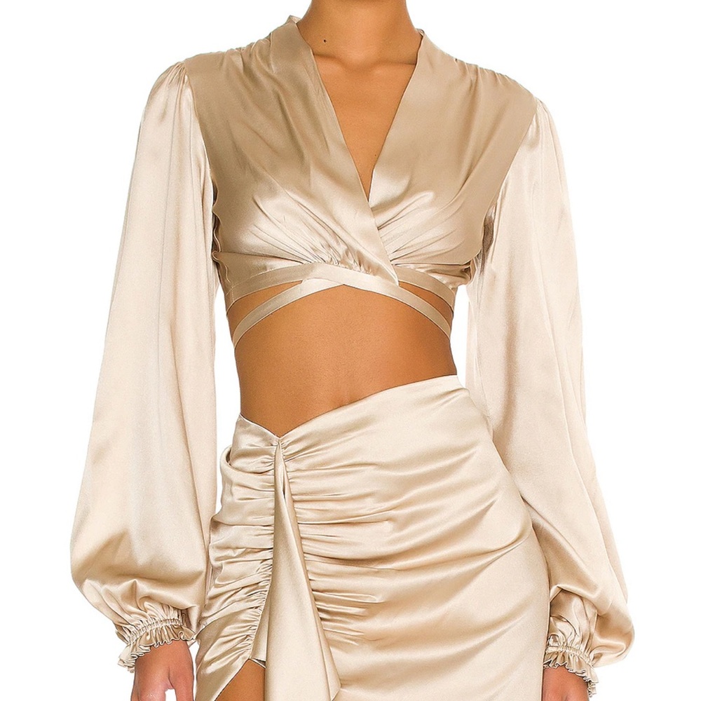 Revolve Iiria Top in Gold
Silk Roads by Adriana Iglesias